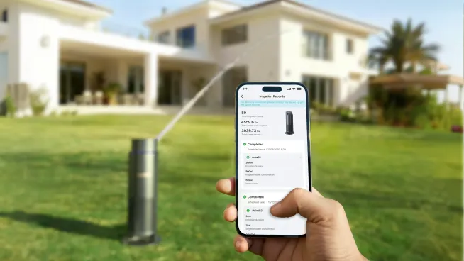 Aiper IrriSense 2 smart irrigation system shown with the app schedule screen for Wi-Fi control and weather-sensing watering.